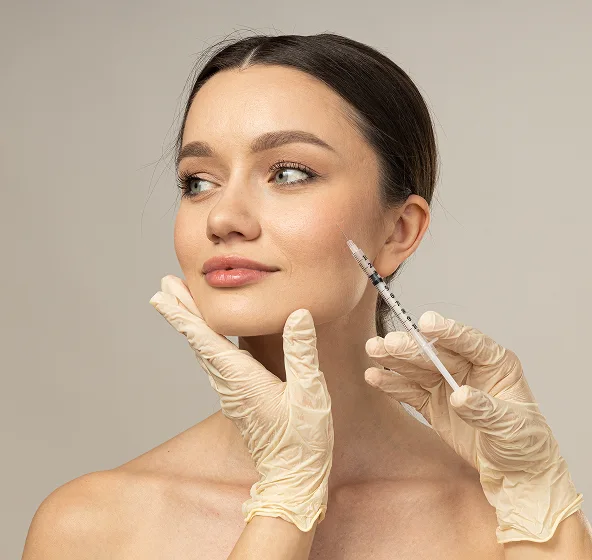 Woman receiving aesthetic injection